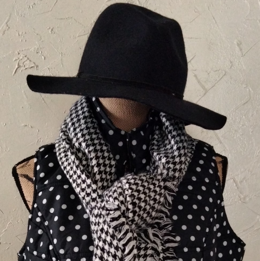 Woman within polka dot vest